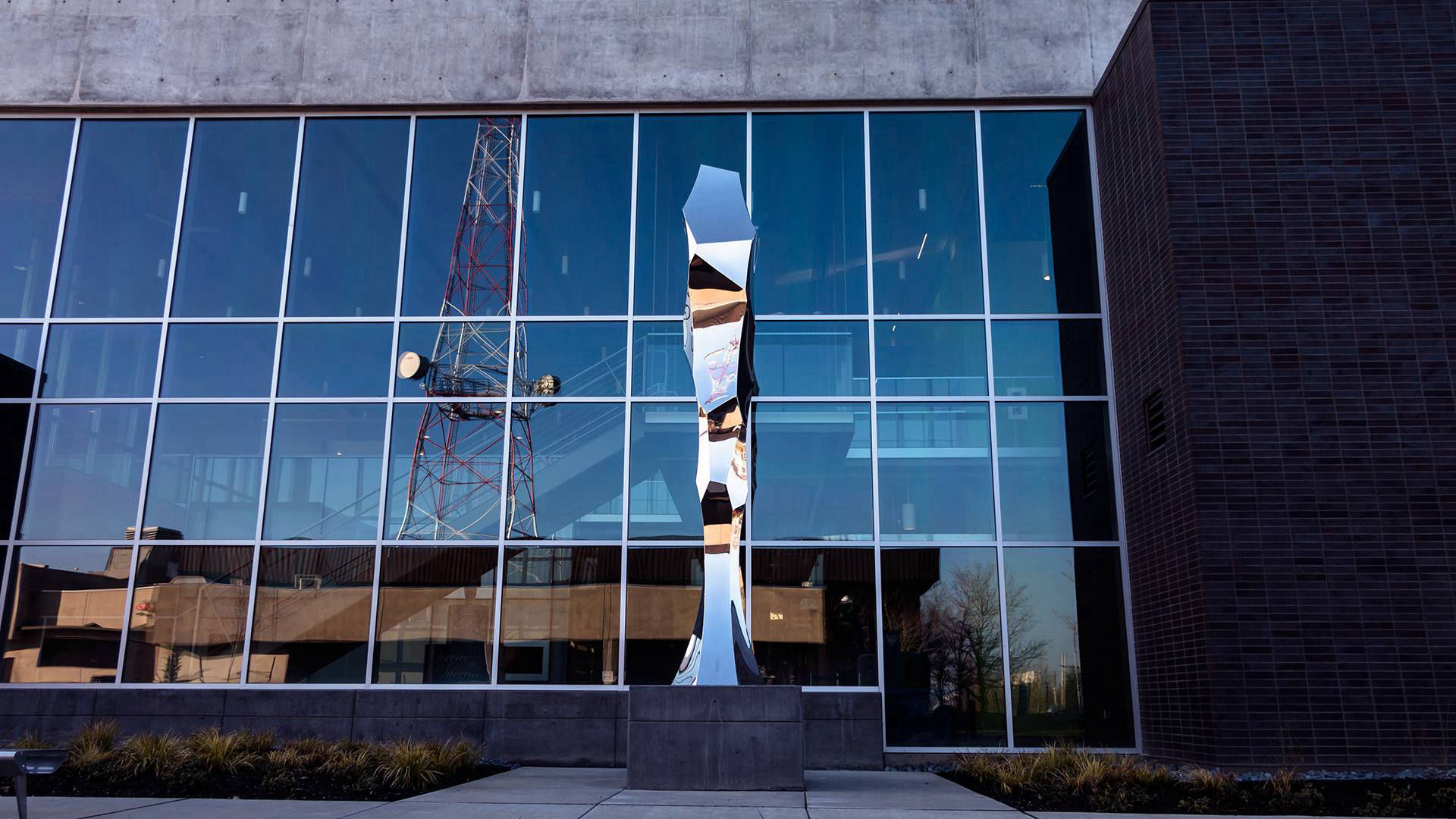 YES mirror polished stainless steel public art sculpture by Heath Satow Tacoma WA