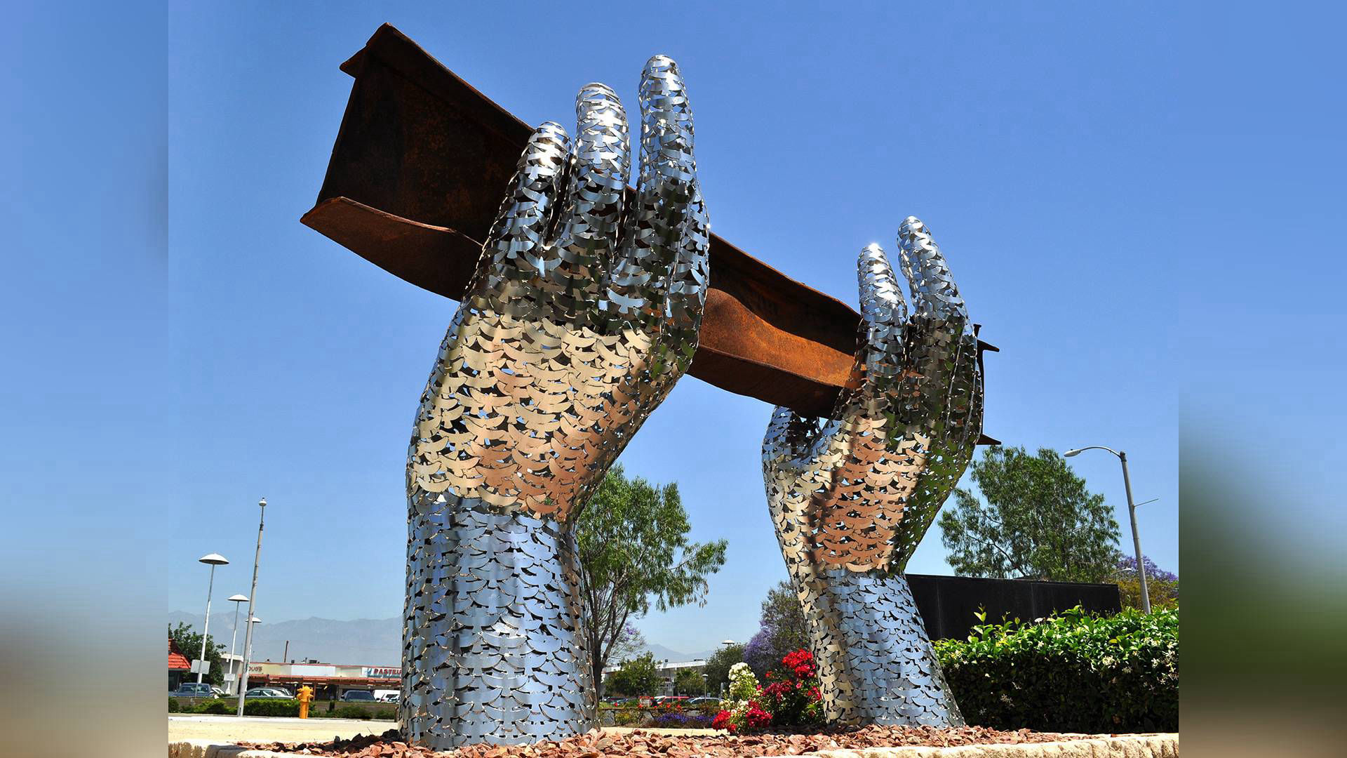 911 Memorial - stainless steel WTC public art sculpture by Heath Satow Rosemead CA