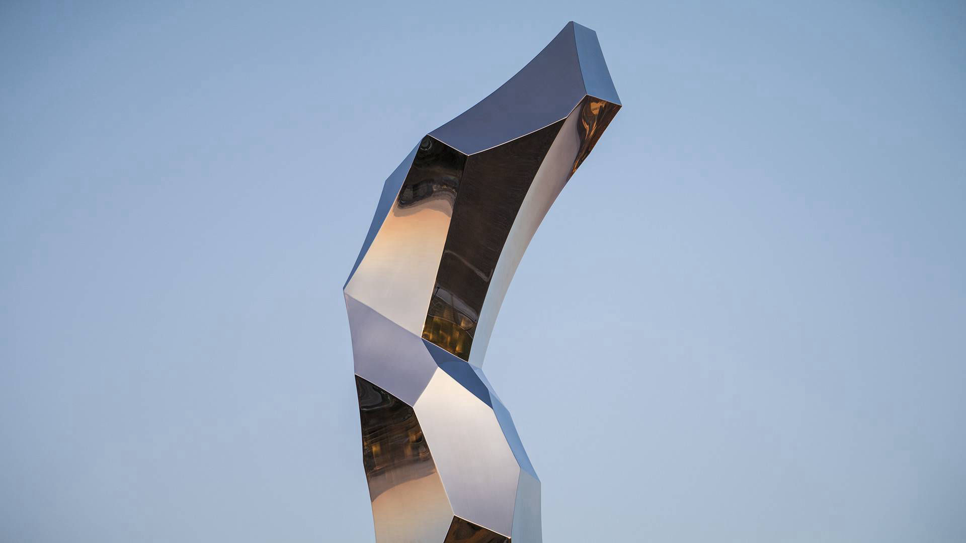 Elatus - mirror polished stainless steel public art sculpture by Heath Satow Dublin CA