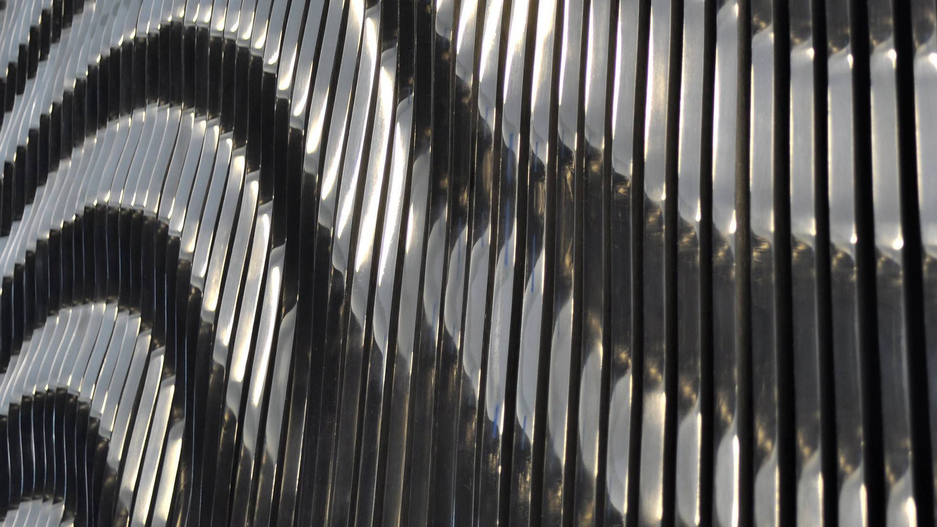Ripple - mirror polished aluminum public art sculpture by Heath Satow Los Angeles CA