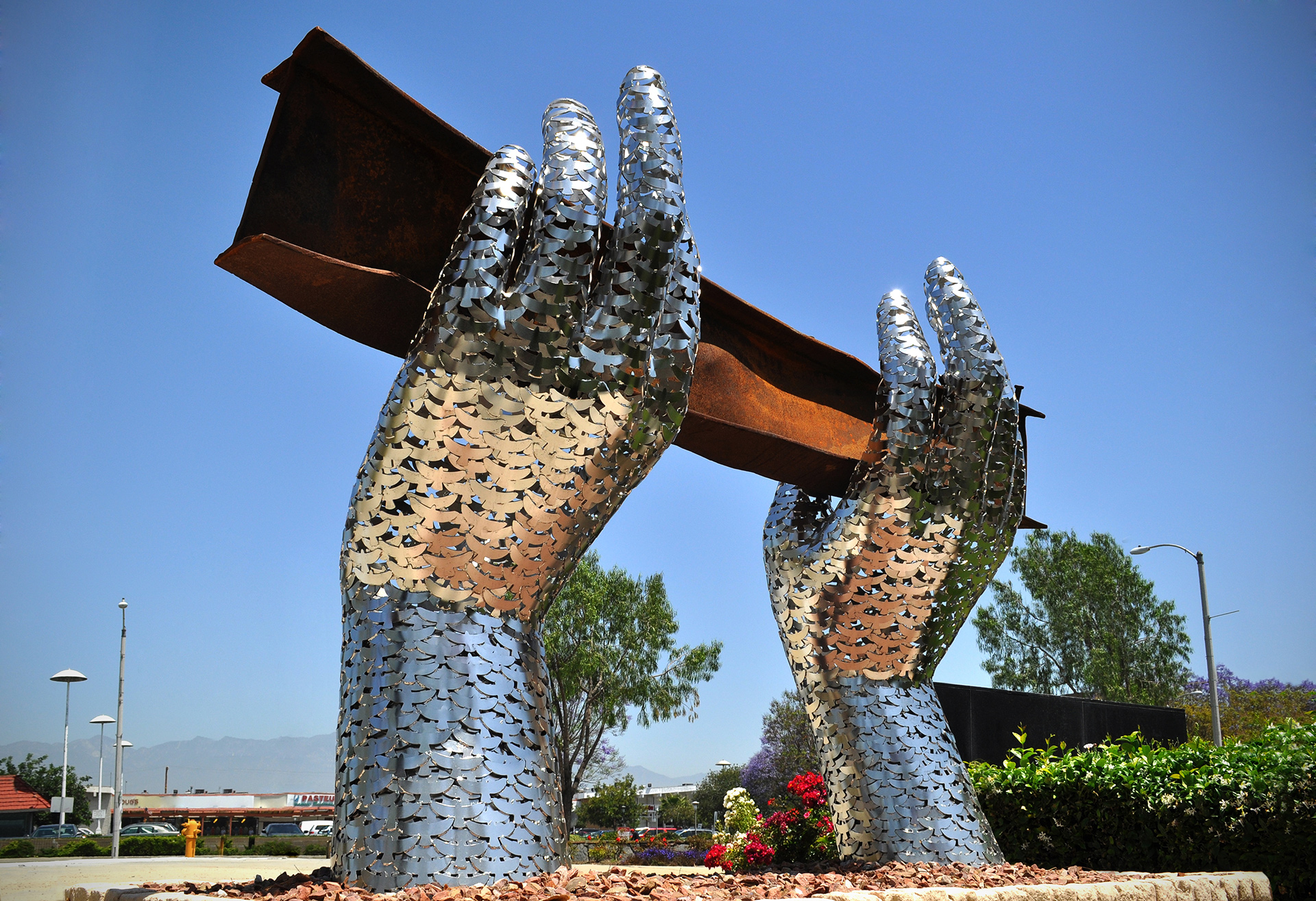 Reflect, a 9/11 Memorial — stainless steel and beam from World Trade Center public art sculpture by Heath Satow, Rosemead, CA