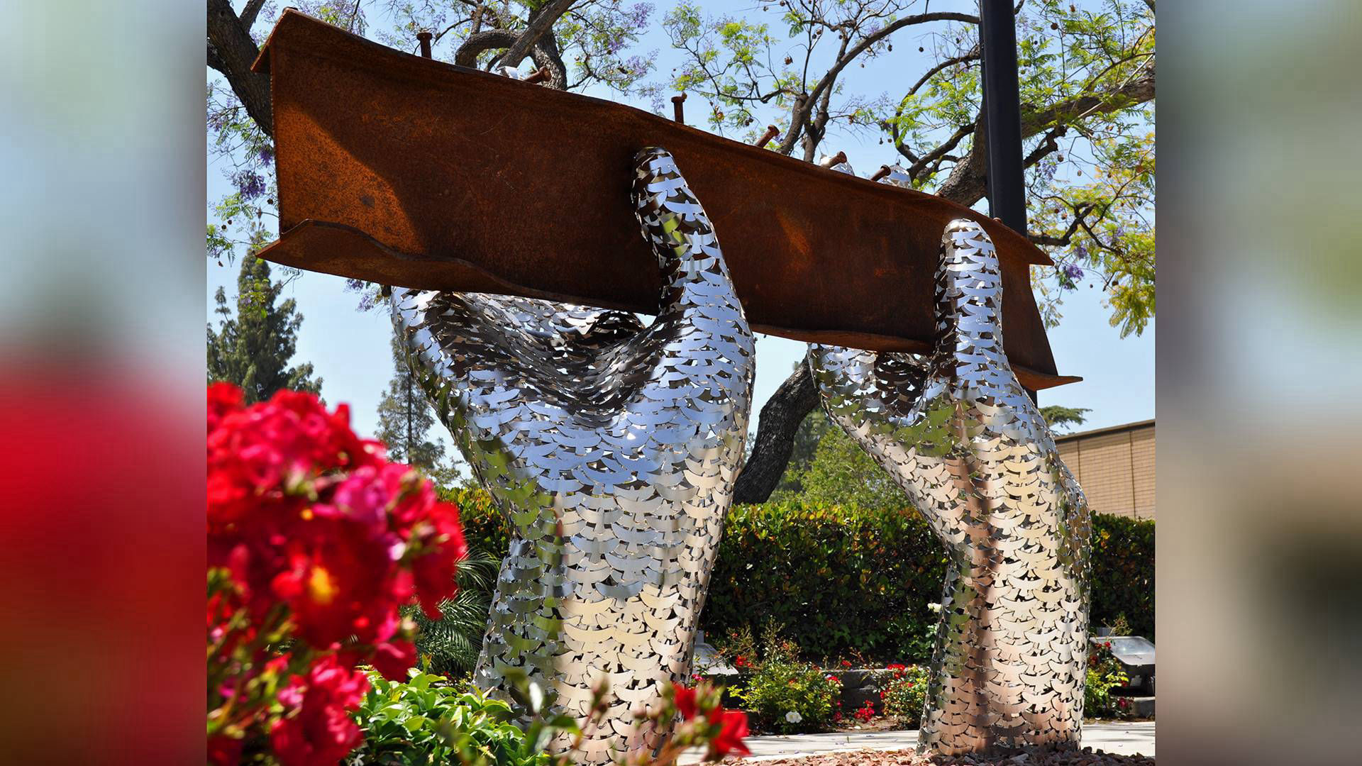 Reflect, a 9/11 Memorial — stainless steel and beam from World Trade Center public art sculpture by Heath Satow, Rosemead, CA