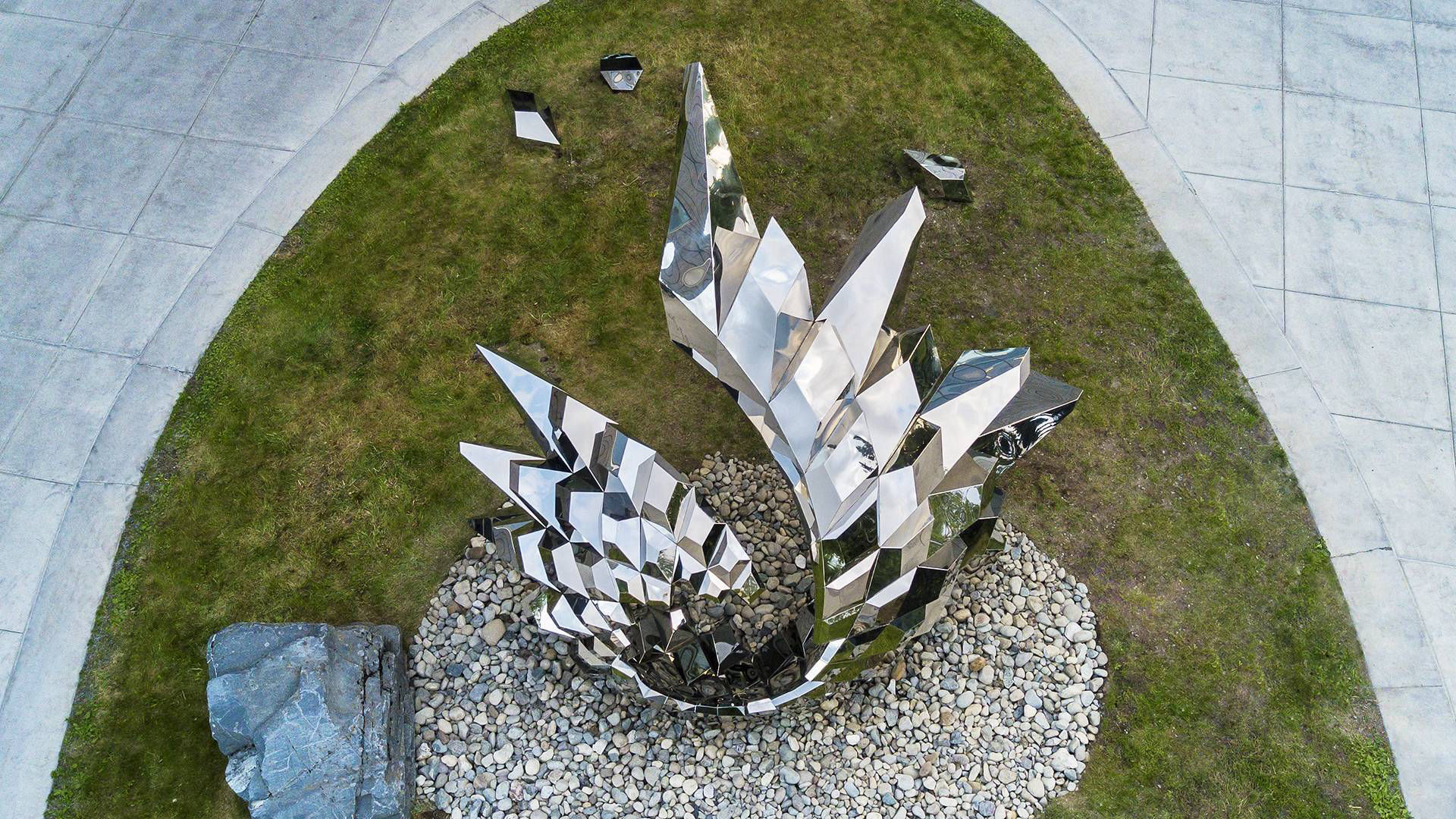 Inflorescence — mirror-polished stainless steel public art sculpture by Heath Satow, Anchorage, AK