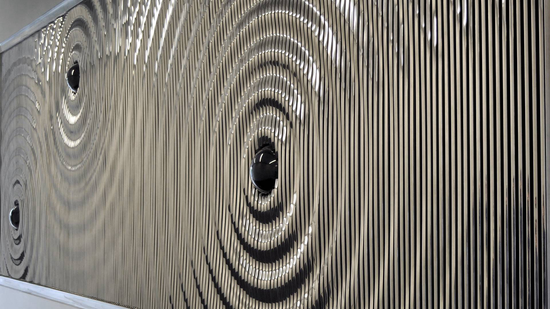 Ripple — polished aluminum and granite public art sculpture by Heath Satow, Los Angeles, CA
