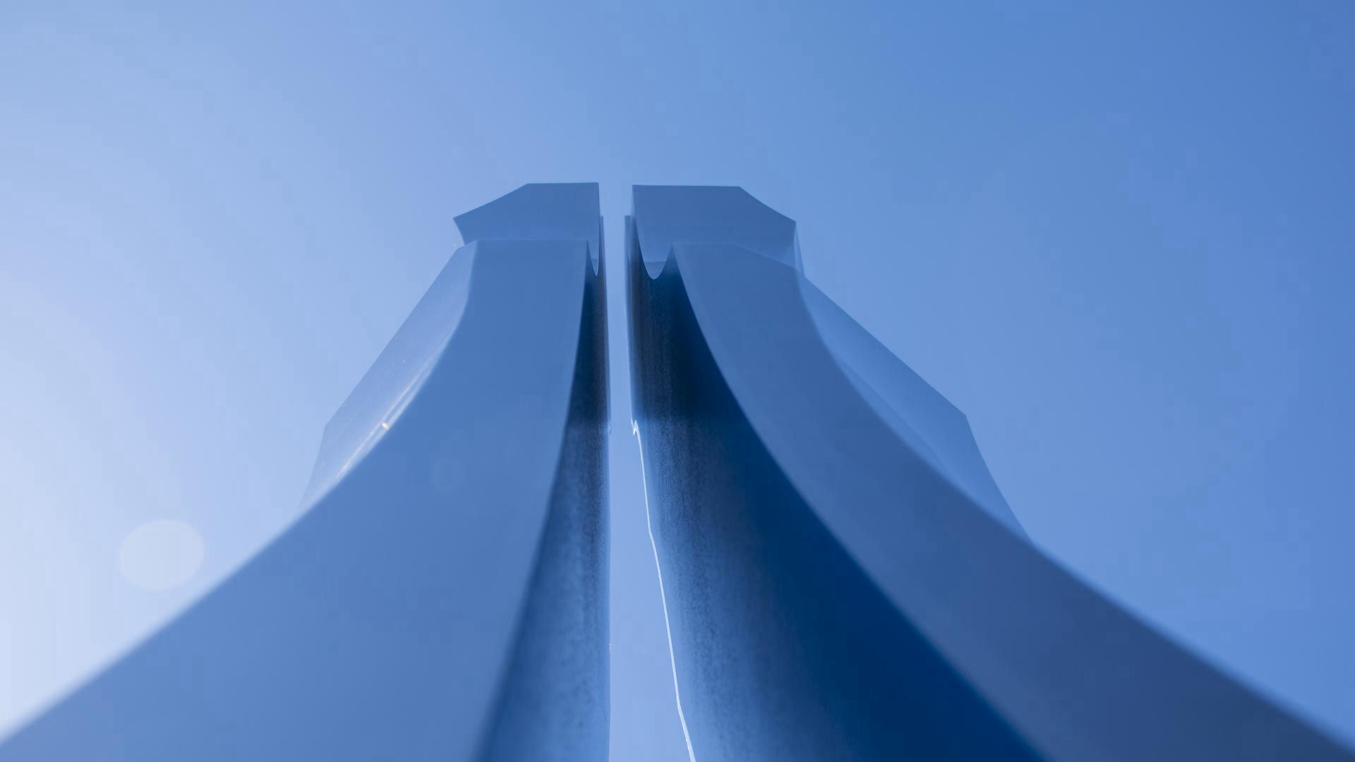 Thin Blue Line — mirror-polished stainless steel and LED lighting public art sculpture by Heath Satow, Moorpark, CA