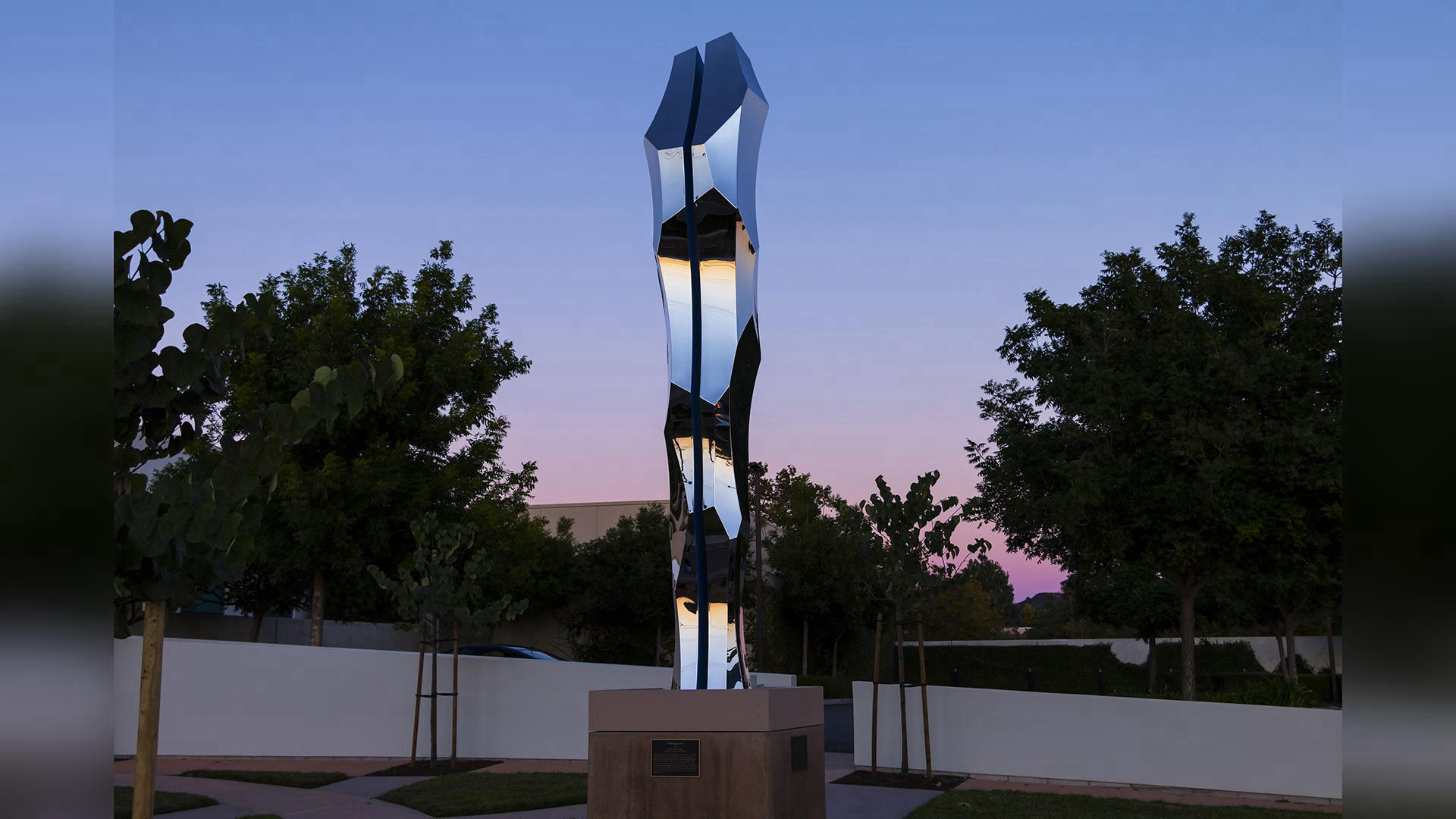 Thin Blue Line — mirror-polished stainless steel and LED lighting public art sculpture by Heath Satow, Moorpark, CA