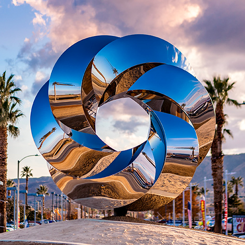Revolution — mirror-polished stainless steel public art sculpture by Heath Satow, Palmdale, California