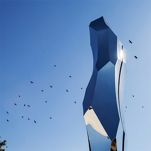 Thin Blue Line — polished stainless steel public art sculpture by Heath Satow, Moorpark, CA